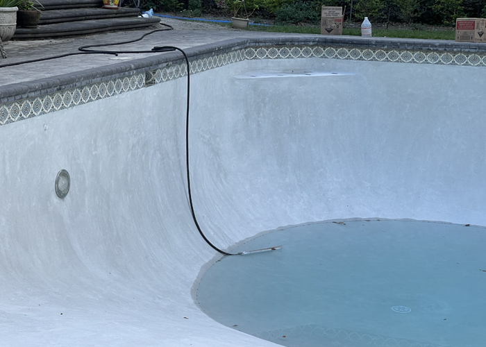 filling a pool with garden hose